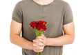 Mid section of man holding bunch of red roses Royalty Free Stock Photo