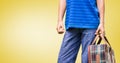 Mid-section of man holding suitcase Royalty Free Stock Photo