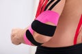 Kinesiology Tape On Man`s Elbow