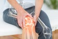 Mid section of man suffering with knee pain Royalty Free Stock Photo
