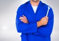 Mid section of mechanic holding a wrench Royalty Free Stock Photo