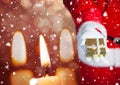 Mid section of santa holding christmas gift Royalty Free Stock Photo