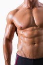 Mid section of shirtless muscular man