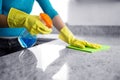 Mid section of woman cleaning kitchen counter Royalty Free Stock Photo