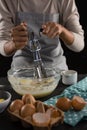 Woman whisking batter in a bowl Royalty Free Stock Photo