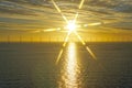 Middelgrunden: an offshore wind farm at dawn. Sunrise over the Sea Royalty Free Stock Photo