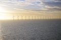 Middelgrunden: an offshore wind farm at dawn. Sunrise over the Sea Royalty Free Stock Photo