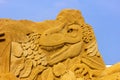 Middelkerke, Belgium - 23 July 2022: An art portrait of a carnotaurus sand sculpture in Middelkerke, Belgium. The prehistoric