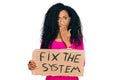 Middle age african american woman holding fix the system banner cardboard covering mouth with hand, shocked and afraid for mistake Royalty Free Stock Photo