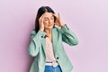 Middle age brunette woman wearing casual clothes suffering from headache desperate and stressed because pain and migraine Royalty Free Stock Photo