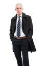 Middle age business man posing wearing raincoat Royalty Free Stock Photo