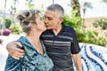 Middle age caucasian couple of husband and wife together on a sunny day outdoors Royalty Free Stock Photo