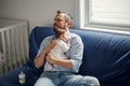 Middle age Caucasian father with sleeping newborn baby girl. Parent holding rocking a child daughter son in hands. Authentic Royalty Free Stock Photo