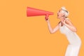 Middle age smiling woman with red megaphone. Royalty Free Stock Photo