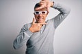 Middle age handsome grey-haired man using 3d glasses over isolated white background smiling making frame with hands and fingers Royalty Free Stock Photo