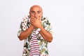 Middle age handsome man on holiday wearing summer shirt over isolated white background shocked covering mouth with hands for Royalty Free Stock Photo