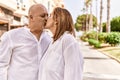 Middle age hispanic couple of husband and wife together on a sunny day outdoors Royalty Free Stock Photo