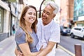 Middle age hispanic couple of husband and wife together on a sunny day outdoors Royalty Free Stock Photo