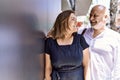 Middle age hispanic couple of husband and wife together on a sunny day outdoors Royalty Free Stock Photo