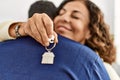 Middle age hispanic couple smiling happy and hugging Royalty Free Stock Photo