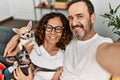 Middle age hispanic couple smiling happy making selfie by the camera Royalty Free Stock Photo