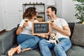 Middle age hispanic couple smiling happy toasting with champagne Royalty Free Stock Photo