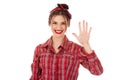 Woman showing hand up with fingers number five