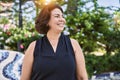 Middle age hispanic woman smiling happy and confident outdoors on a sunny day Royalty Free Stock Photo