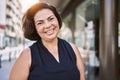 Middle age hispanic woman smiling happy and confident outdoors on a sunny day Royalty Free Stock Photo