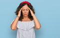 Middle age hispanic woman wearing casual clothes suffering from headache desperate and stressed because pain and migraine Royalty Free Stock Photo