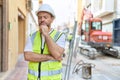 Middle age man architect standing with doubt expression at street Royalty Free Stock Photo