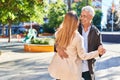 Middle age man and woman couple smiling confident dancing at park Royalty Free Stock Photo