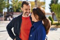 Middle age man and woman couple standing together at park Royalty Free Stock Photo