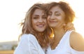Middle age woman with her adult daughter in sunset light Royalty Free Stock Photo