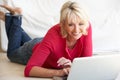 Middle age woman on her laptop computer Royalty Free Stock Photo