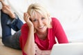Middle age woman on her laptop computer Royalty Free Stock Photo