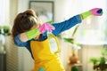 Woman with cleaning agent and sponge dabbing