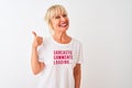 Middle age woman wearing fanny t-shirt with irony comments over isolated white background happy with big smile doing ok sign,