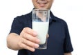 A middle-aged Asian man is drinking a fresh glass of milk on white background Royalty Free Stock Photo