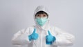 Middle aged asian nurse woman wearing PPE body suit Royalty Free Stock Photo