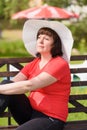 A middle-aged brunette white hat Royalty Free Stock Photo