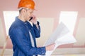 Construction worker consulting with somebody Royalty Free Stock Photo