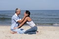 Middle-aged couple on the beach