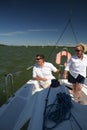 Middle-aged couple on boat sailing Royalty Free Stock Photo