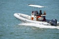 Middle aged couple cruising the Florida Intra-Coastal Waterway in a Pontoon Fishing Boat