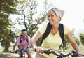 Middle Aged Couple Cycling Through Countryside Royalty Free Stock Photo