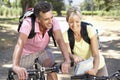 Middle Aged Couple Cycling Through Countryside Royalty Free Stock Photo