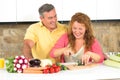 Middle-aged couple in the kitchen