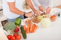 Middle-aged couple preparing a meal