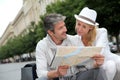 Middle-aged couple sighseeing in town Royalty Free Stock Photo